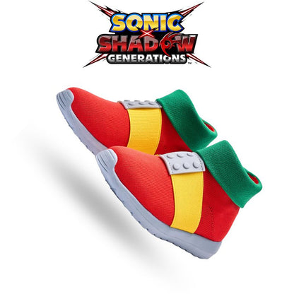 Red and black Knuckles sneakers with reinforced soles for grip and comfort.